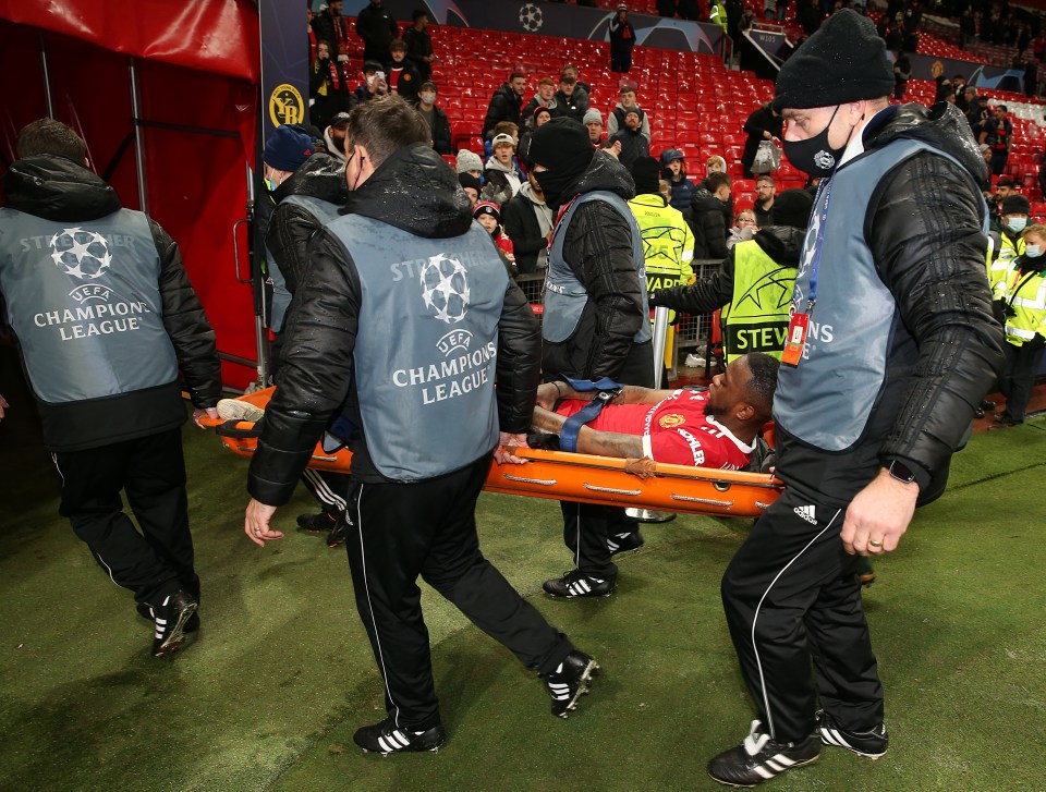 The defender looked to be in pain as he was stretchered off the field