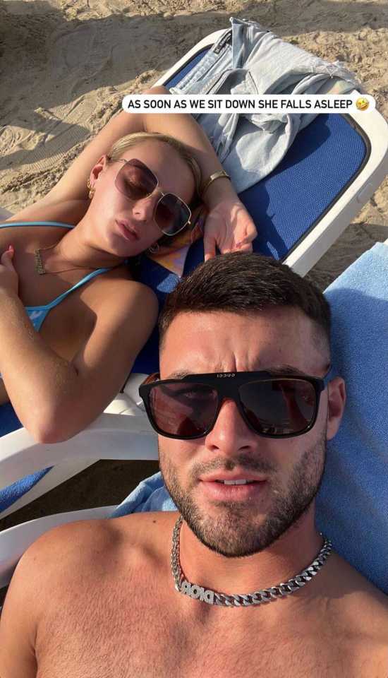 Liam Reardon took a sneaky snap of Millie Court snoozing on the beach in Dubai