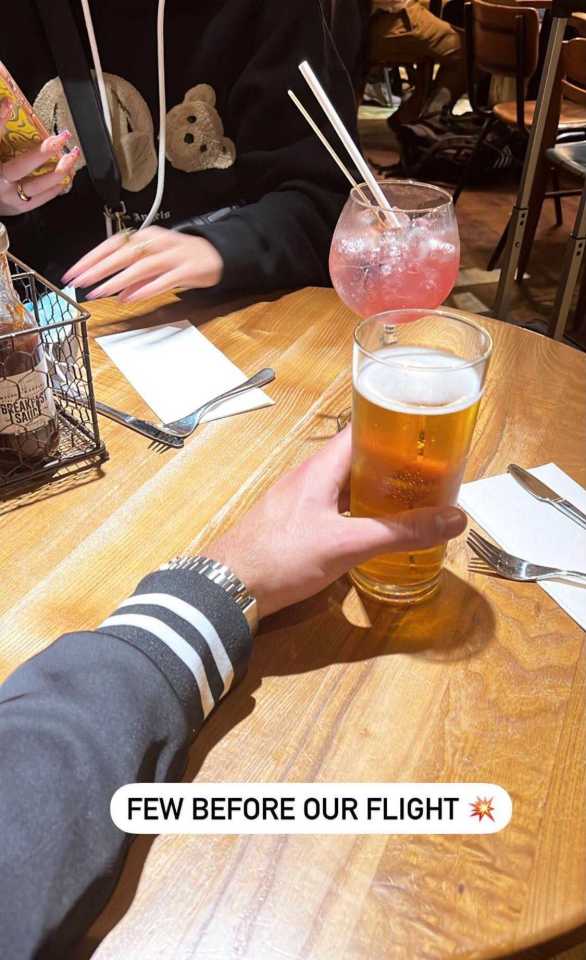 Welshman Liam made sure to get a beer in before the flight while Millie enjoyed a glass of pink gin