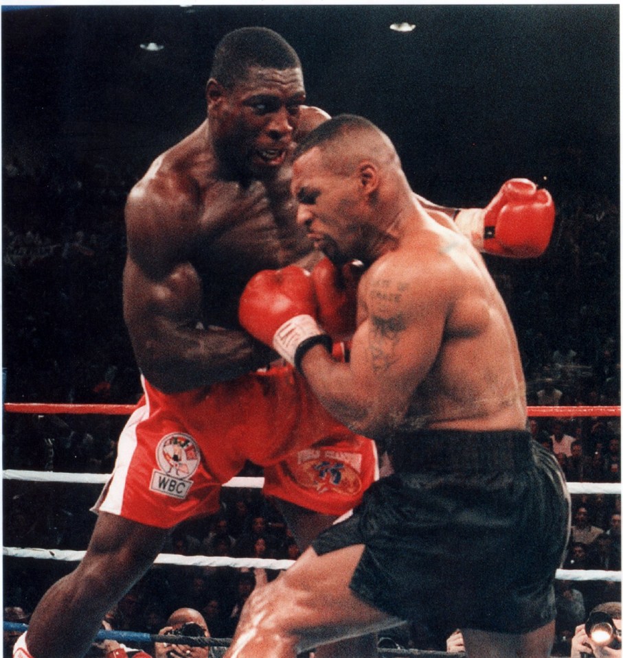 Frank fighting ruthless US heavyweight Mike Tyson in 1996