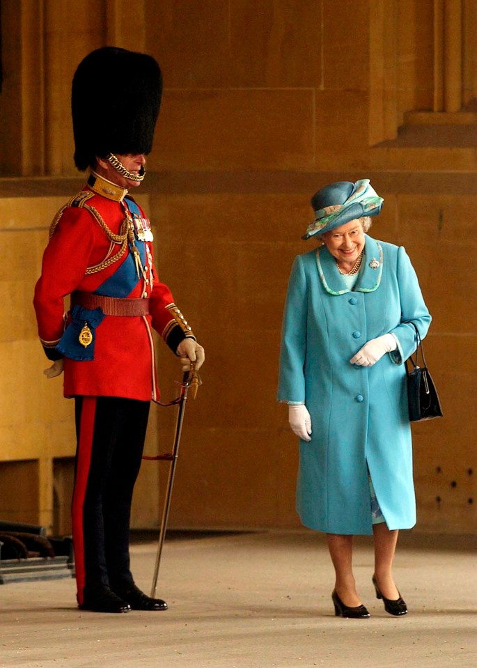 The Queen giggling as she walks past Prince Philip - she talked about her late husband's sense of fun