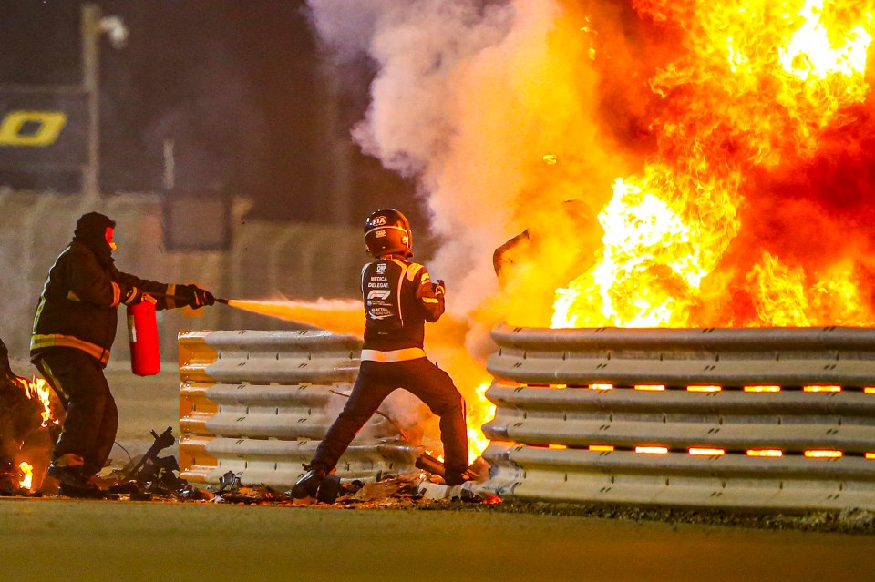 Martials swiftly put out the blaze as Grosjean was rushed to safety