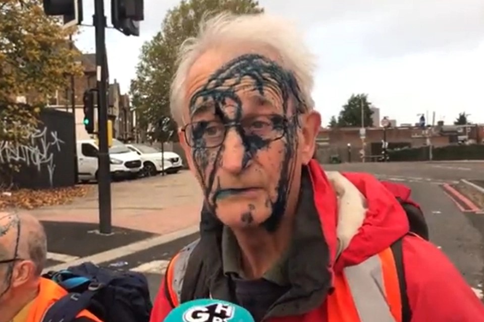 A raging driver hurled ink at Insulate Britain protesters who blocked the A40 in London