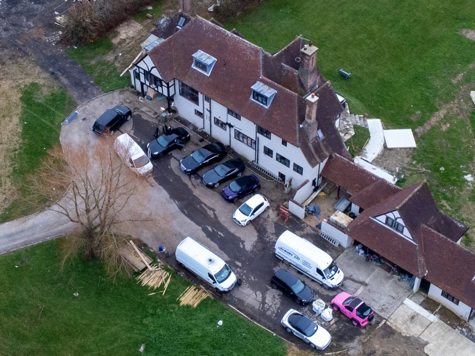 Katie Price's fiance is now selling a fleet of 12 second hand motors from outside the star's mucky mansion