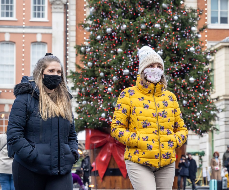 Masks are now mandatory in England in shops and on public transport to curb the spread of Omicron