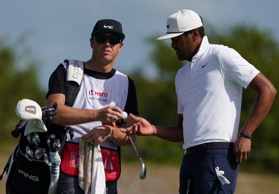 Billionaire businessman Ryan Smith caddied for old friend Tony Finau at the Hero World Challenge in the Bahamas last week