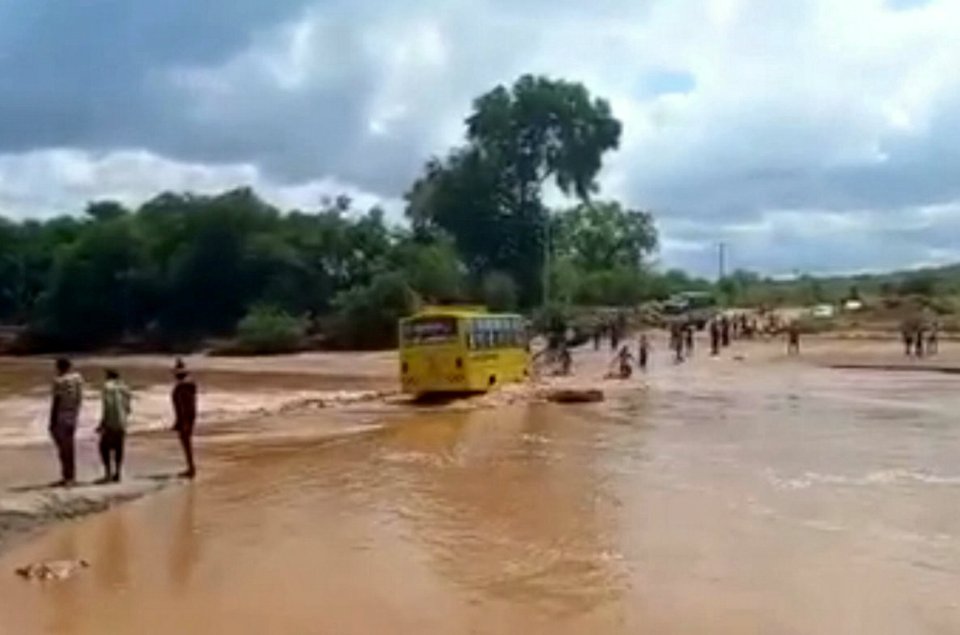 The vehicle decided to take its chances and began to drive slowly across the murky water