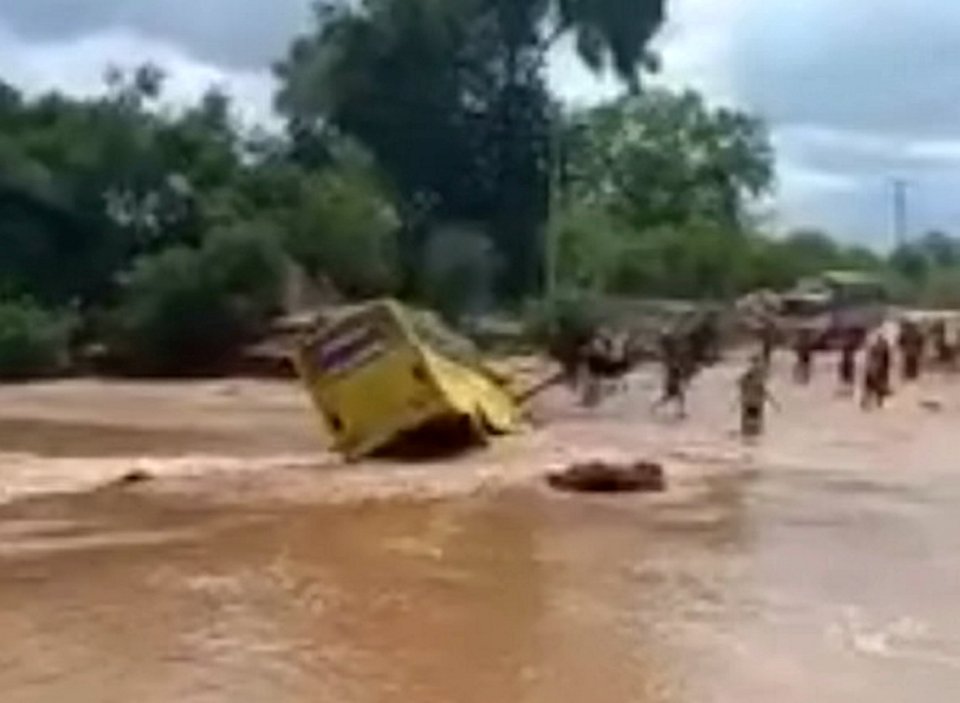 More than 30 are dead after a bus was swept away in raging floods in Kenya