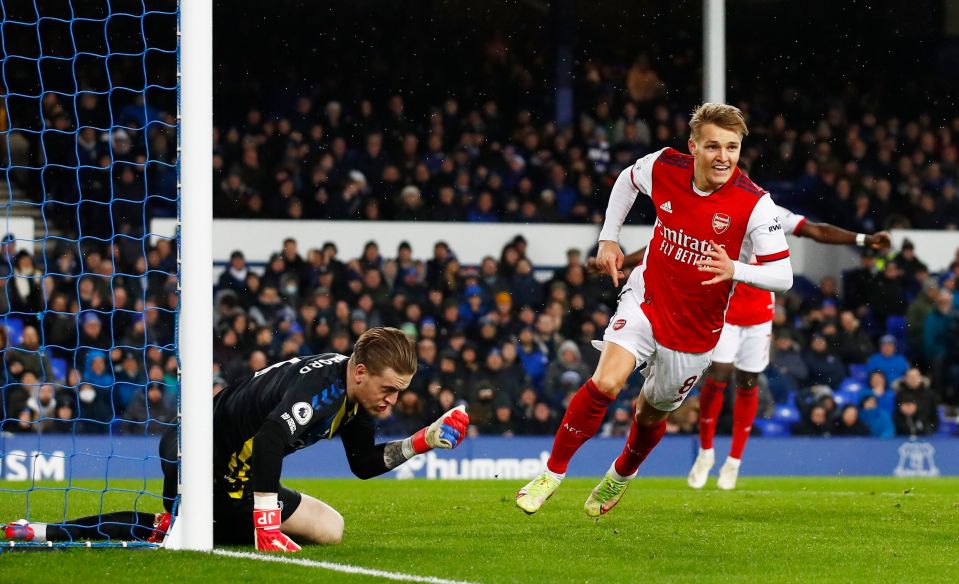 Martin Odegaard wheels away in celebration