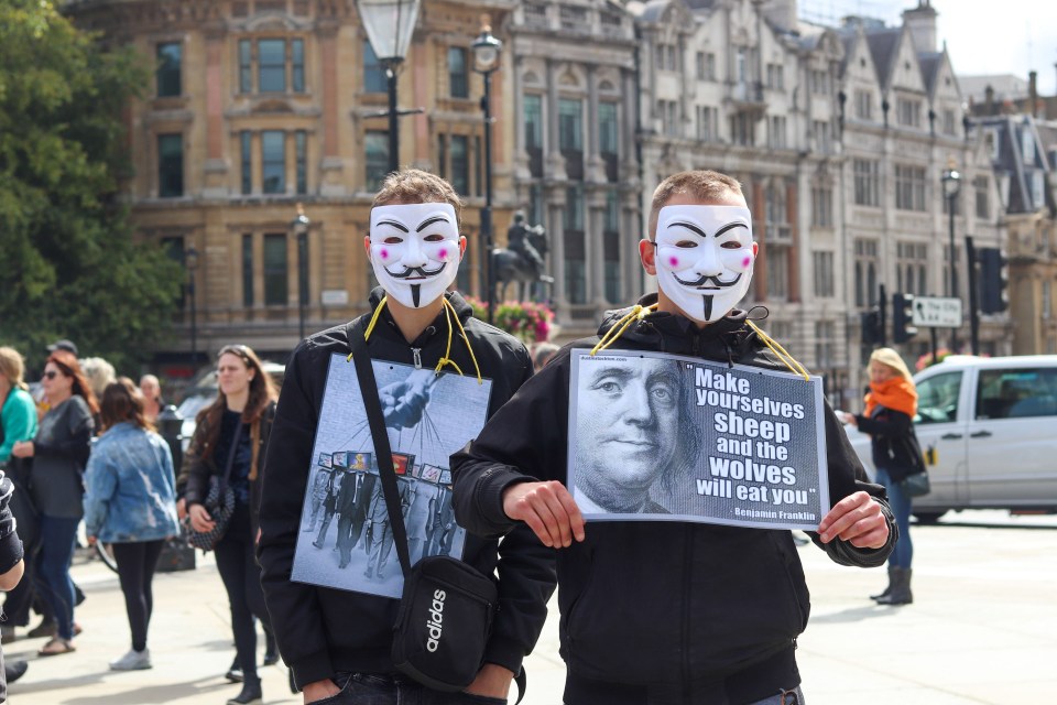 Thousands of Brits voiced their support for QAnon at a rally this summer outside the Houses of Parliament