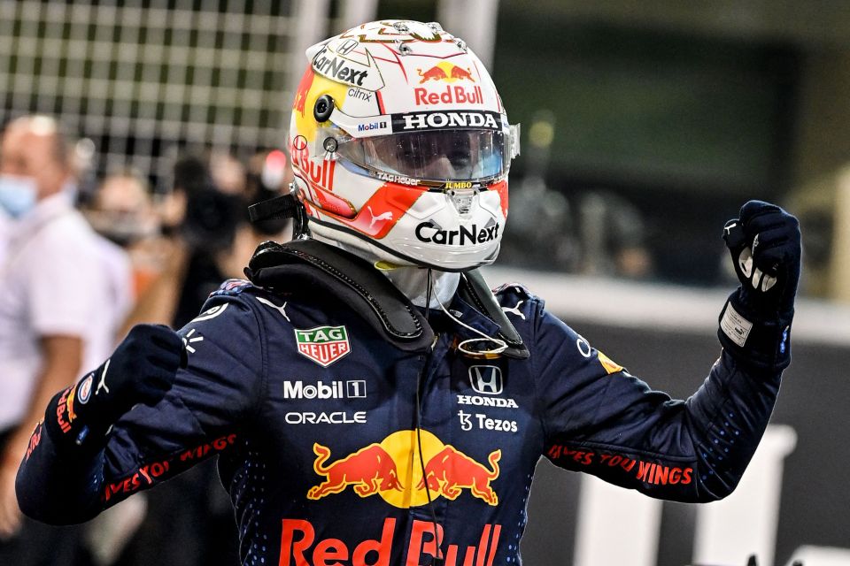 Max Verstappen celebrates after taking pole position in Abu Dhabi