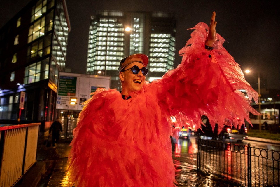 The comic paraded his flamboyant feathery suit in Birmingham