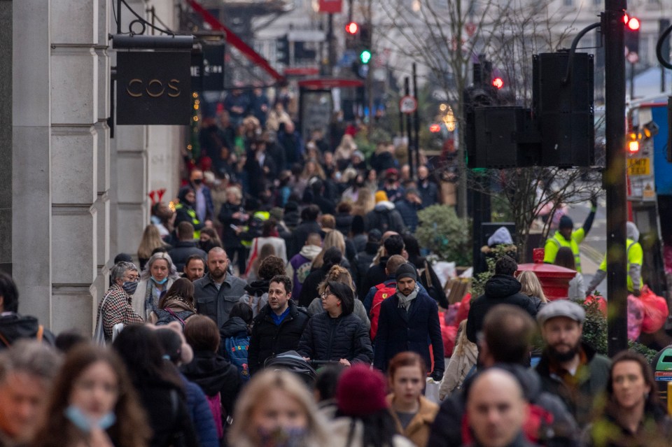 Shoppers take to Christmas shopping in the West End on the last Saturday before Christmas Day