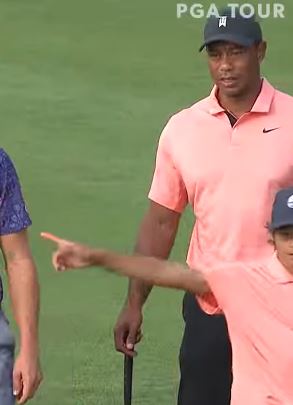 Tiger Woods' son Charlie showed his cheeky side as he celebrated a super putt