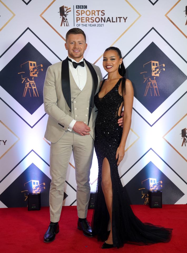 Adam Peaty rocked the tan three-piece after swapping the pool for the ballroom for the red carpet