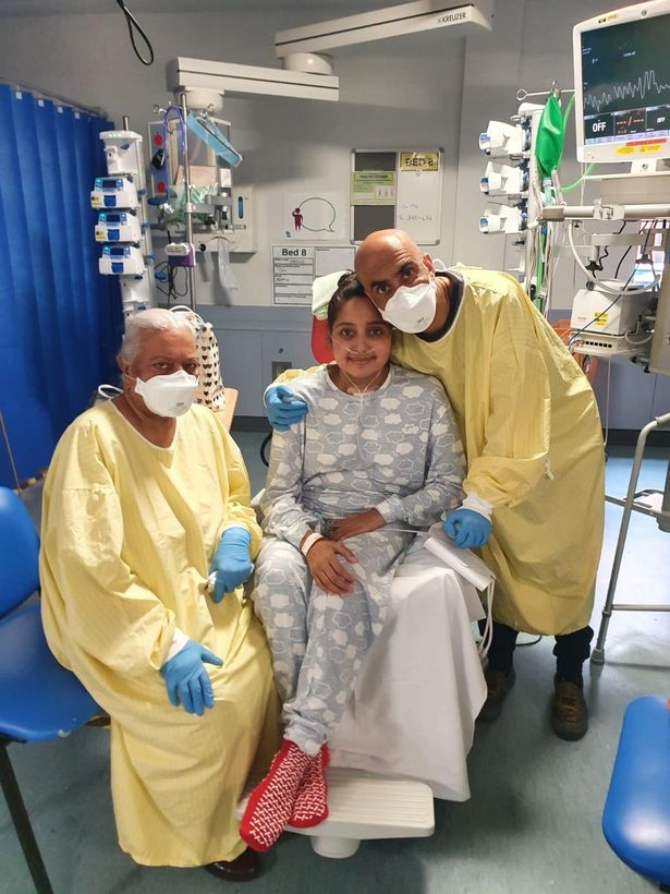 Tanviha with her mother and husband when she awoke from the ten-week coma