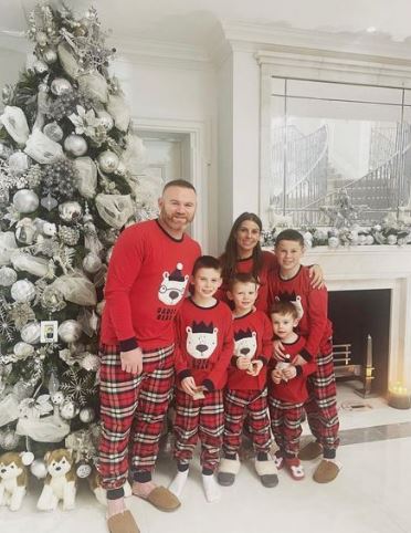 Rooney and family dressed up in matching Christmas pyjamas