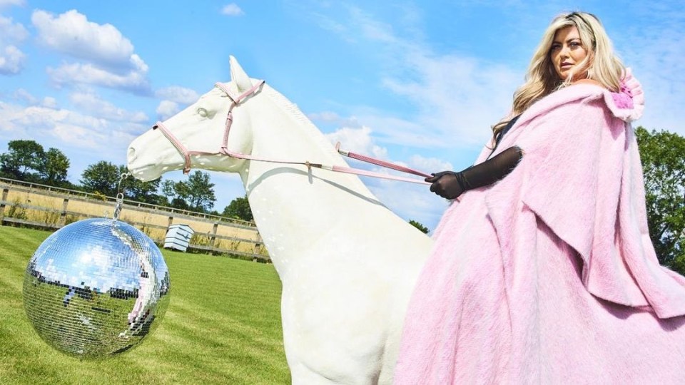 Gemma Collins rode a white horse while wearing a pink cape