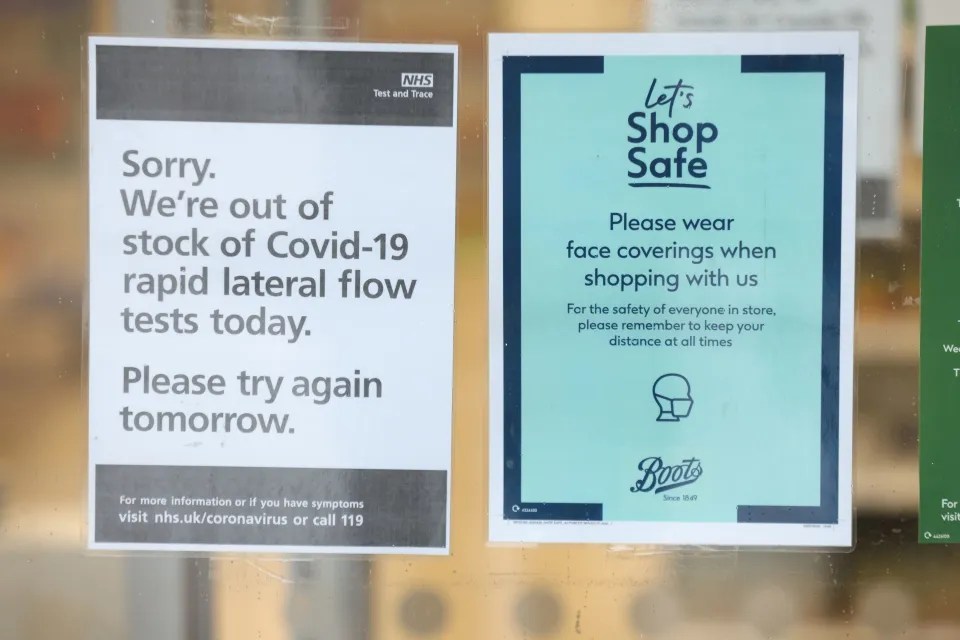 An 'out of stock' sign on the window of a Boots pharmacy in London