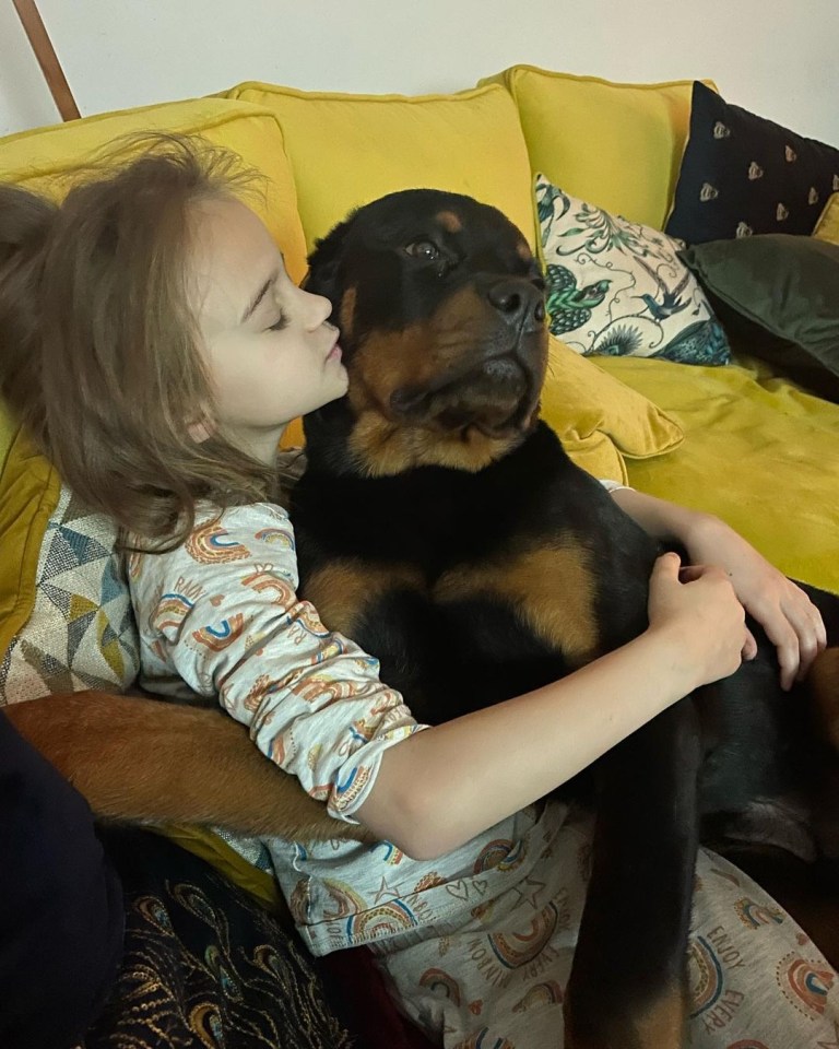 Kerry Katona shared a snap of her daughter cuddling up to her protection dog