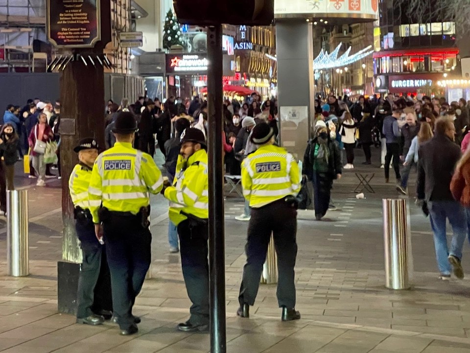 Police in Central London before the biggest party of the year