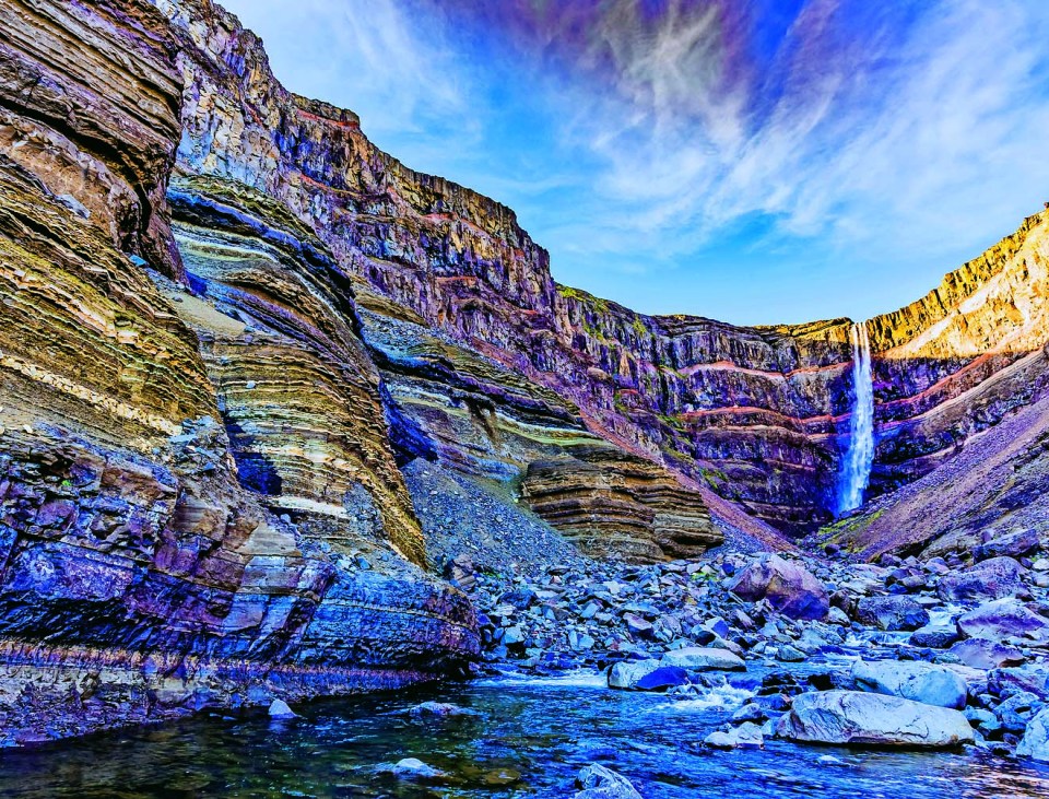 Hike the stunning ice-capped Hengifoss mountain - home to Iceland’s third-highest waterfall