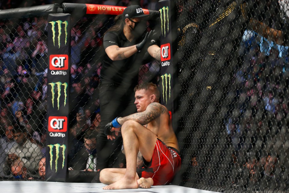 A dejected Dustin Poirer looks on following his devastating loss to Charles Oliveira