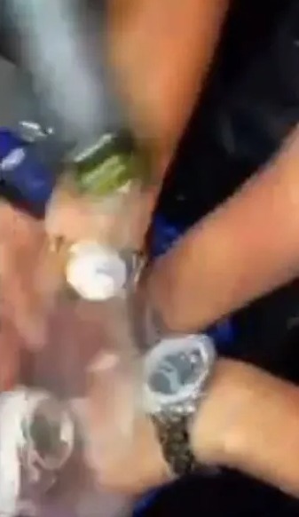 The shocking moment the dealer pours champagne over Rolex watches was filmed