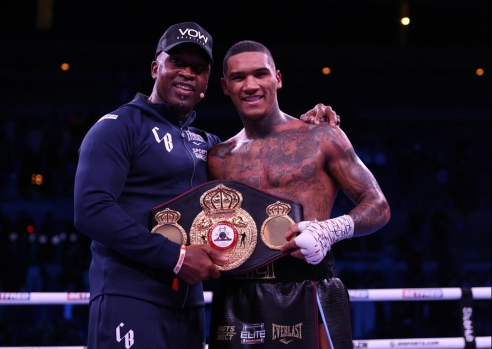 Conor Benn, pictured with boxing legend dad Nigel, is ready to fight for world titles