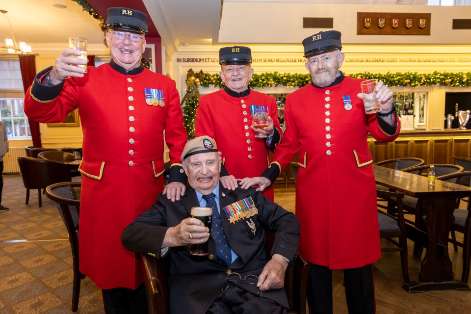 John beamed as he had his first pint of Guinness with new pals