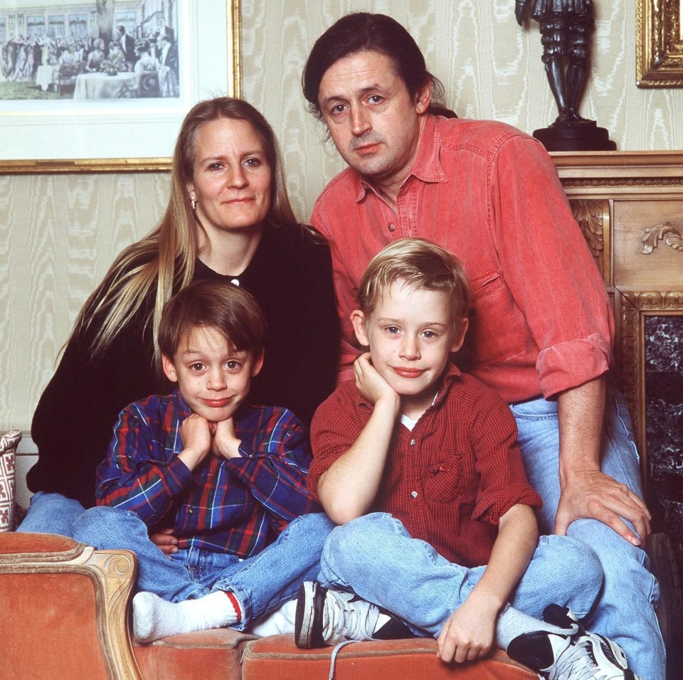 Kieran and Macaulay with parents Patricia and Christopher in 1990