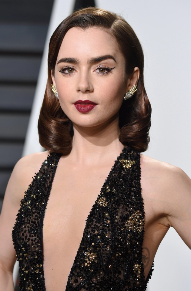 Blood-sucking vampire pouts as seen on Lily Collins are a 2022 must-have