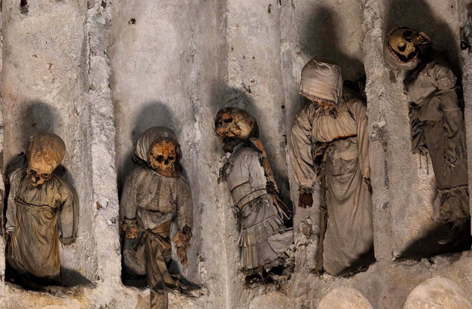 The bodies line the walls of the corridors and crypts of the cavernous underground tomb