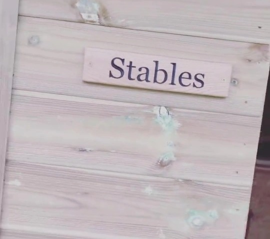 The home even comes with its own stables