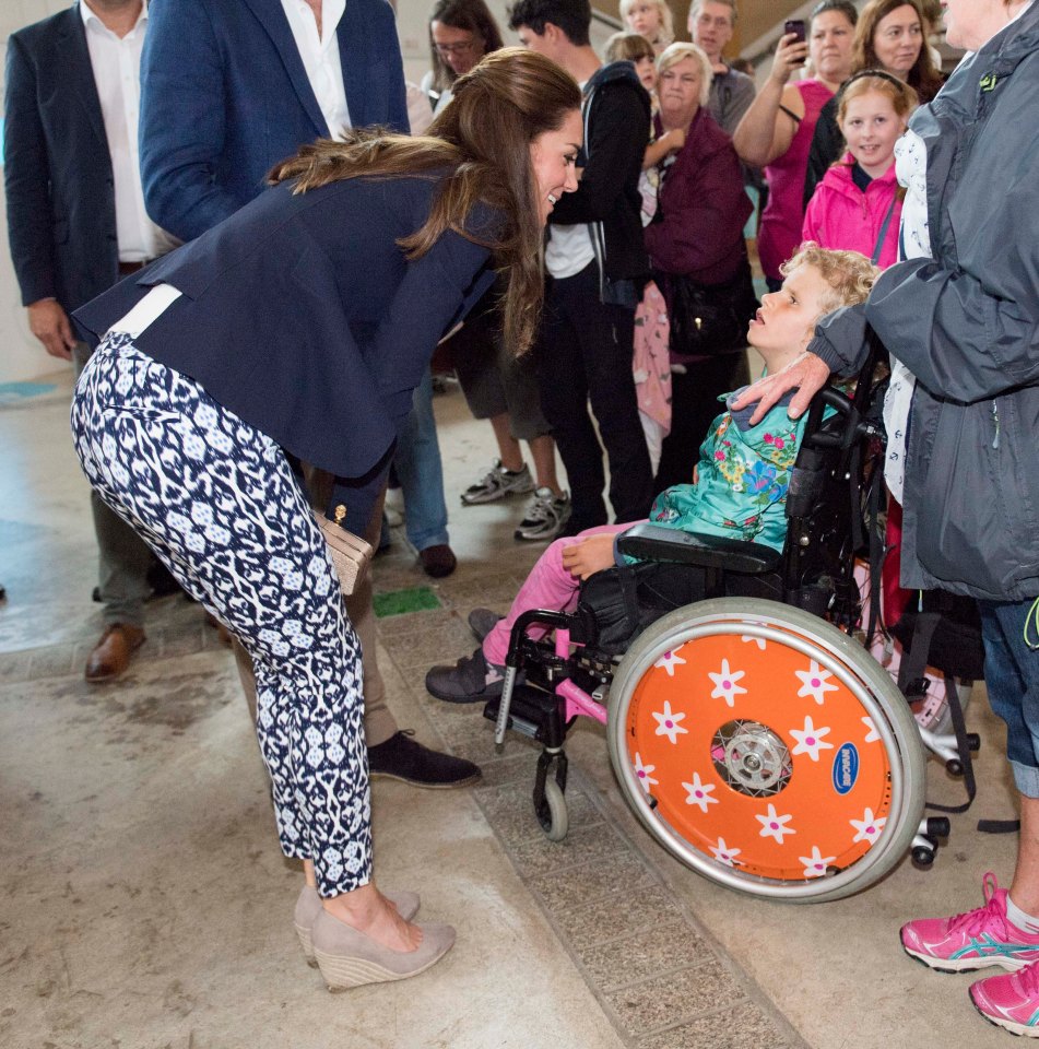 Kate displays her compassion when meeting youngster Sophie Hipps at the Eden Project