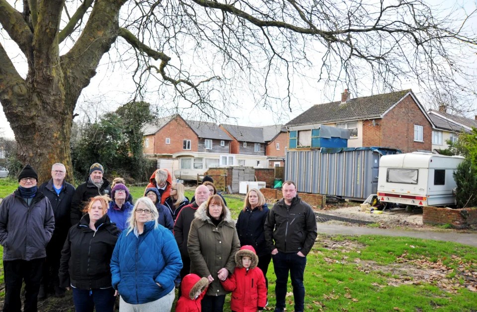 Local residents in front of the shipping container in Lillie's front garden