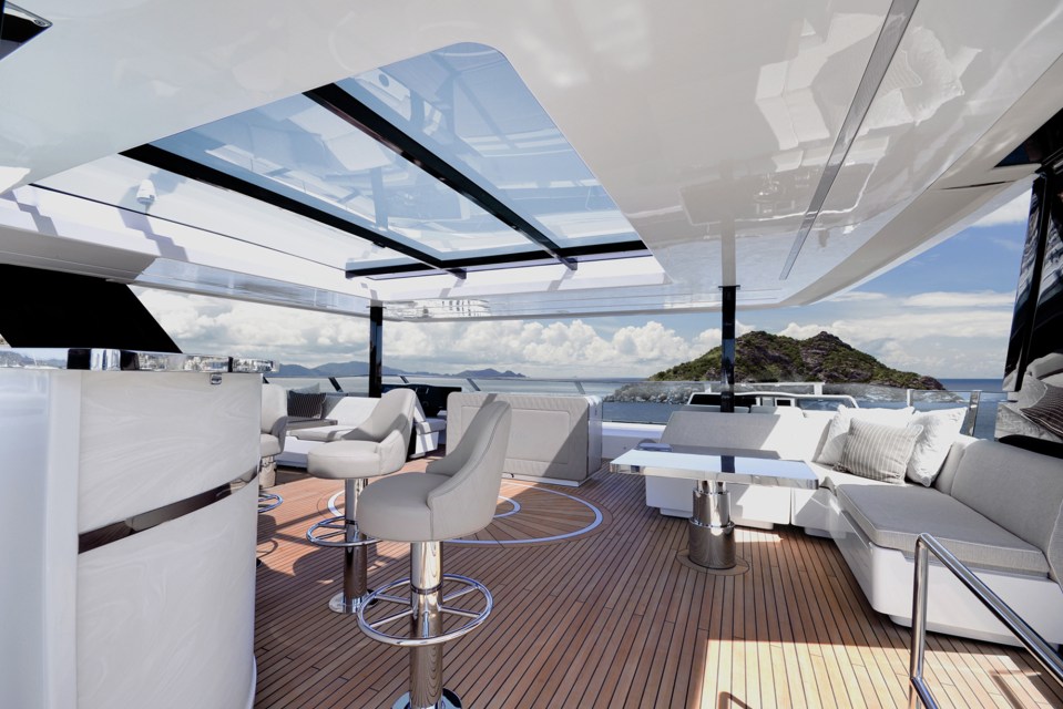 the inside of a boat with a glass roof