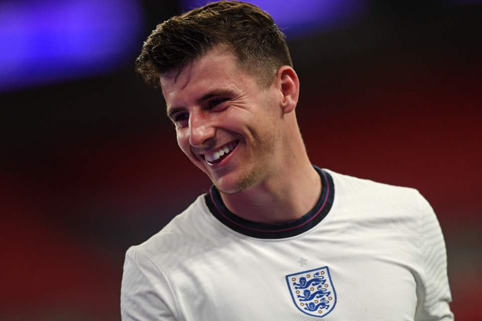 The Chelsea star serves up the same smile as he plays for England