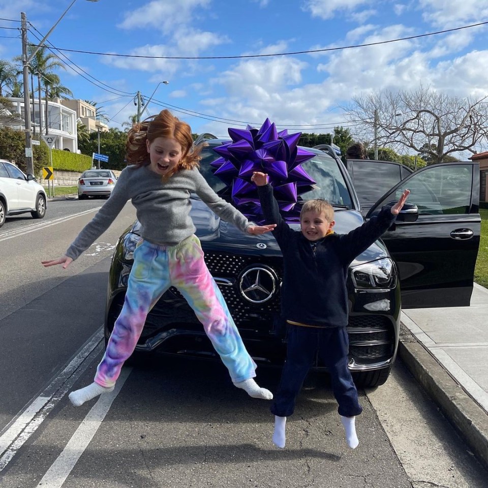 Pixie and brother Hunter with her new car