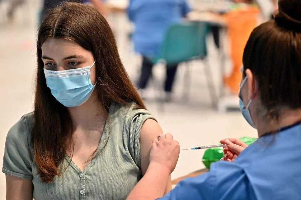 Scots may have to wear masks in public places for years to come, Nicola Sturgeon said today