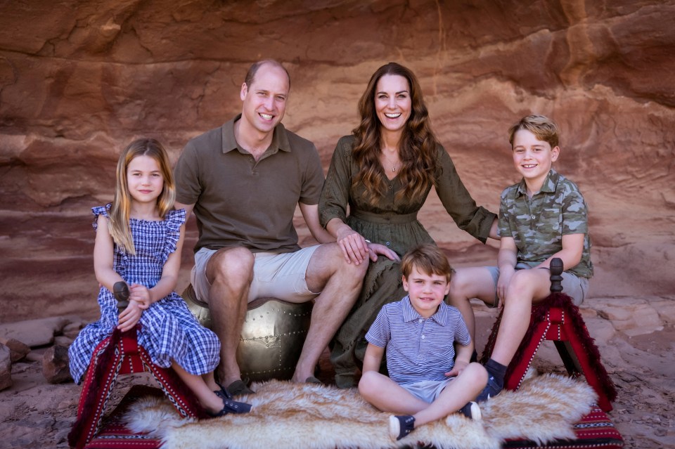 Their Royal Highnesses' Christmas card showing Britain's Prince William, Duke of Cambridge and Britain's Catherine, Duchess of Cambridge with their three children Prince George, Princess Charlotte and Prince Louis in Jordan