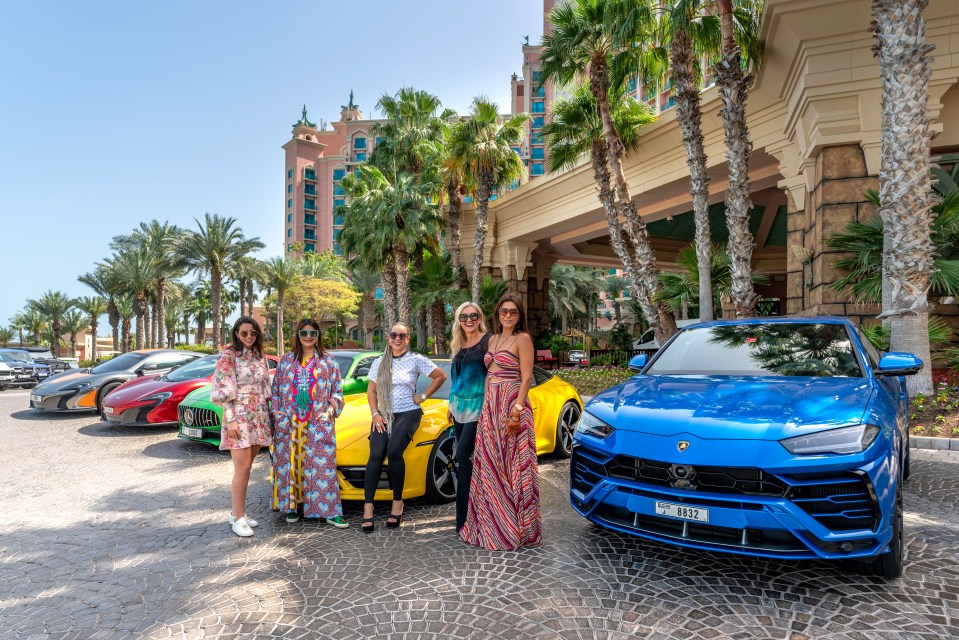 Ladies with their posh motors