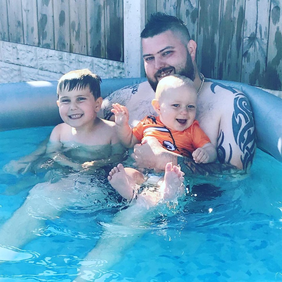 Smith and his two boys relax in the family hot tub on the farm