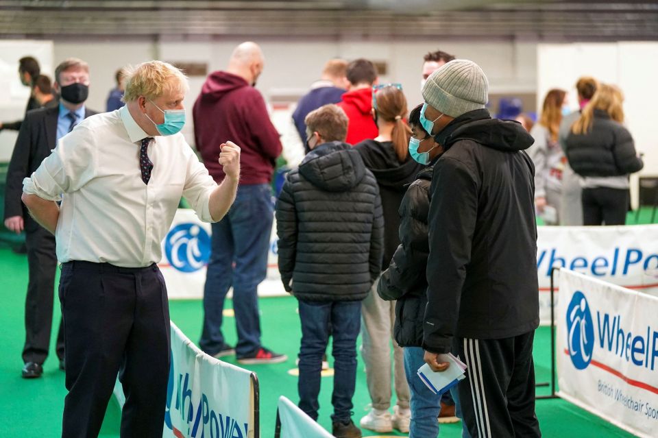 Boris Johnson spoke with Brits at a vaccination hub at Stoke Mandeville Stadium in Aylesbury, Bucks, today