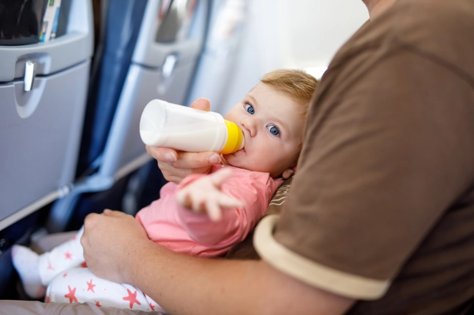 Only children under two-years-old can sit on a parent's lap while flying