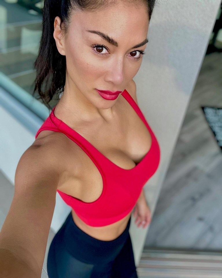 Nicole looked sensational in her red sports bra