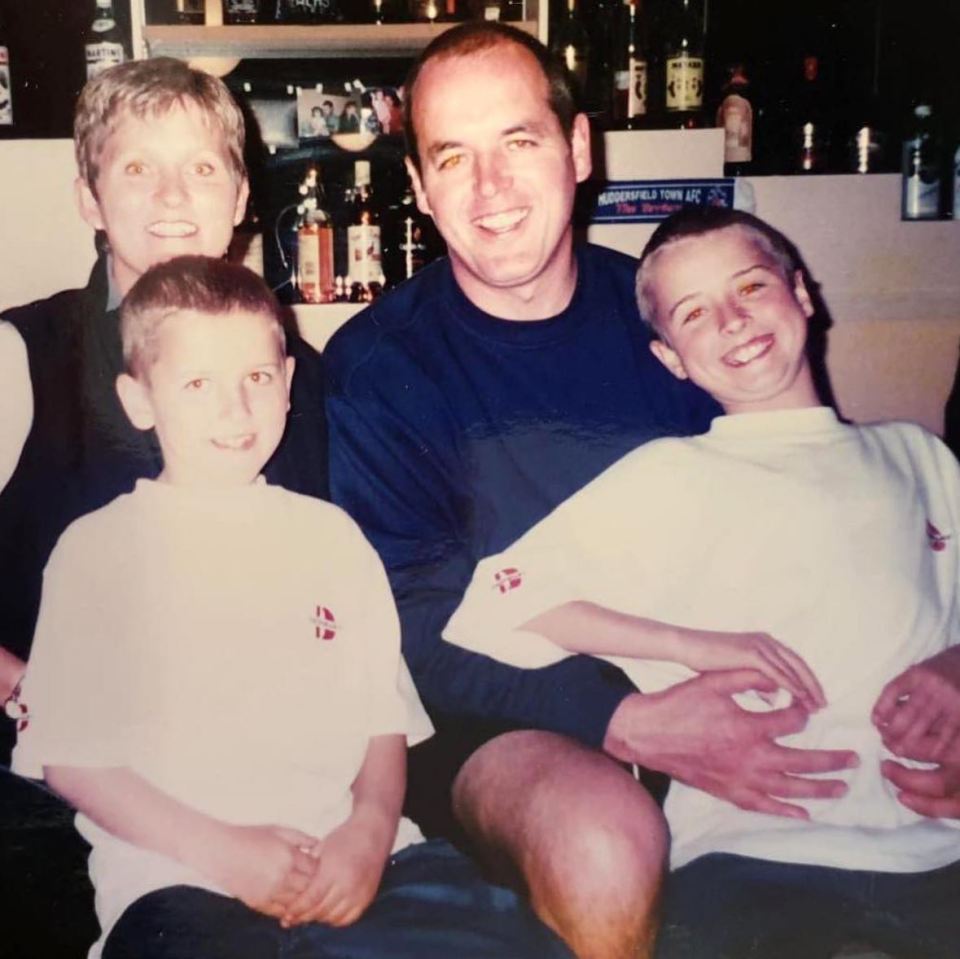 Harry Kane, left, is pictured as a youngster alongside his parents and brother Charlie