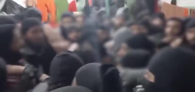 Footage shows fighters pledging allegiance to the Caliphate before their prison break