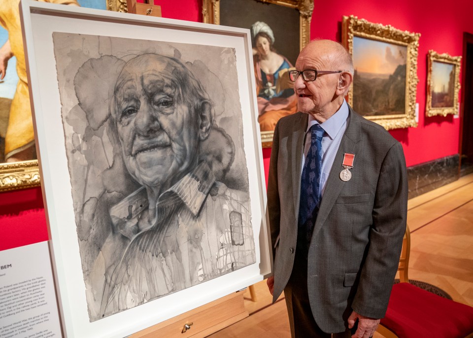 Proud Zigi, 92, with his portrait