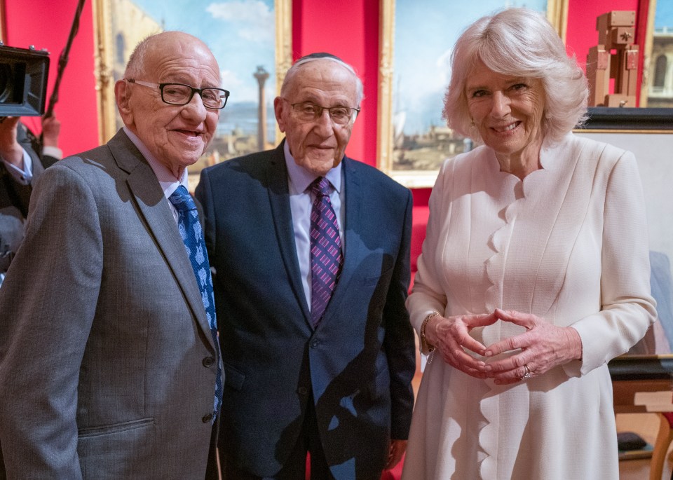 Survivors Zigi Shipper, 92, and Manfred Goldberg, 91, with Camilla Duchess of Cornwall